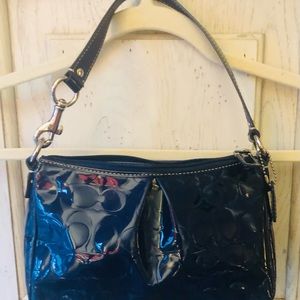 Coach “C” printed navy patent leather small purse; excellent condition.